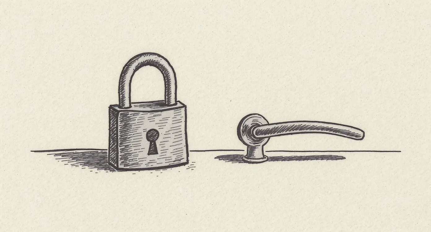 A heavy closed padlock and an elegant door handle sit side by side on a flat surface, separated by a small gap. Neither is attached to a door.