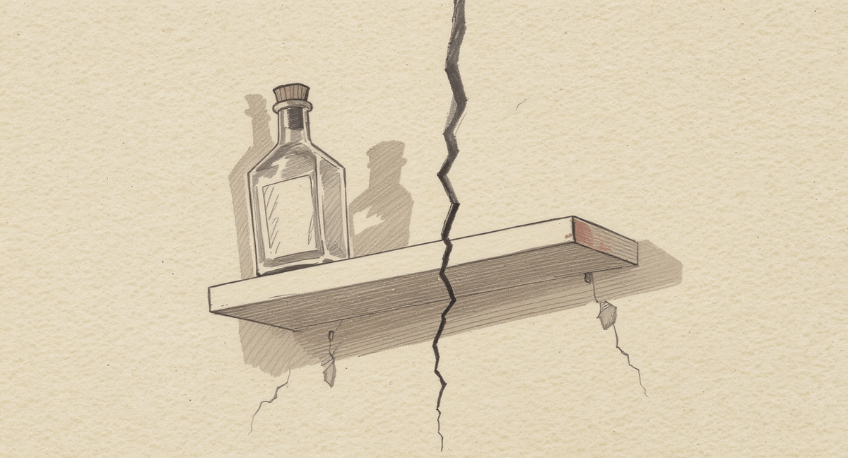 A glass bottle displayed neatly on a wall-mounted shelf, while a wide crack splits the wall behind it from top to bottom, with debris on the floor beneath.