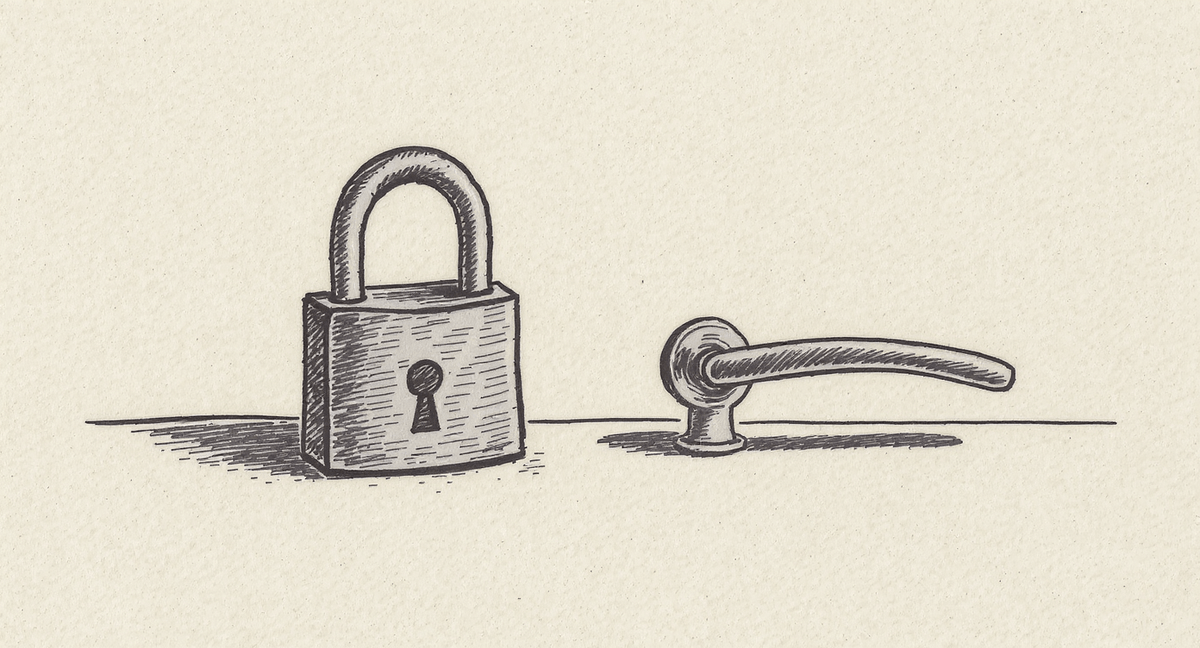 A heavy closed padlock and an elegant door handle sit side by side on a flat surface, separated by a small gap. Neither is attached to a door.