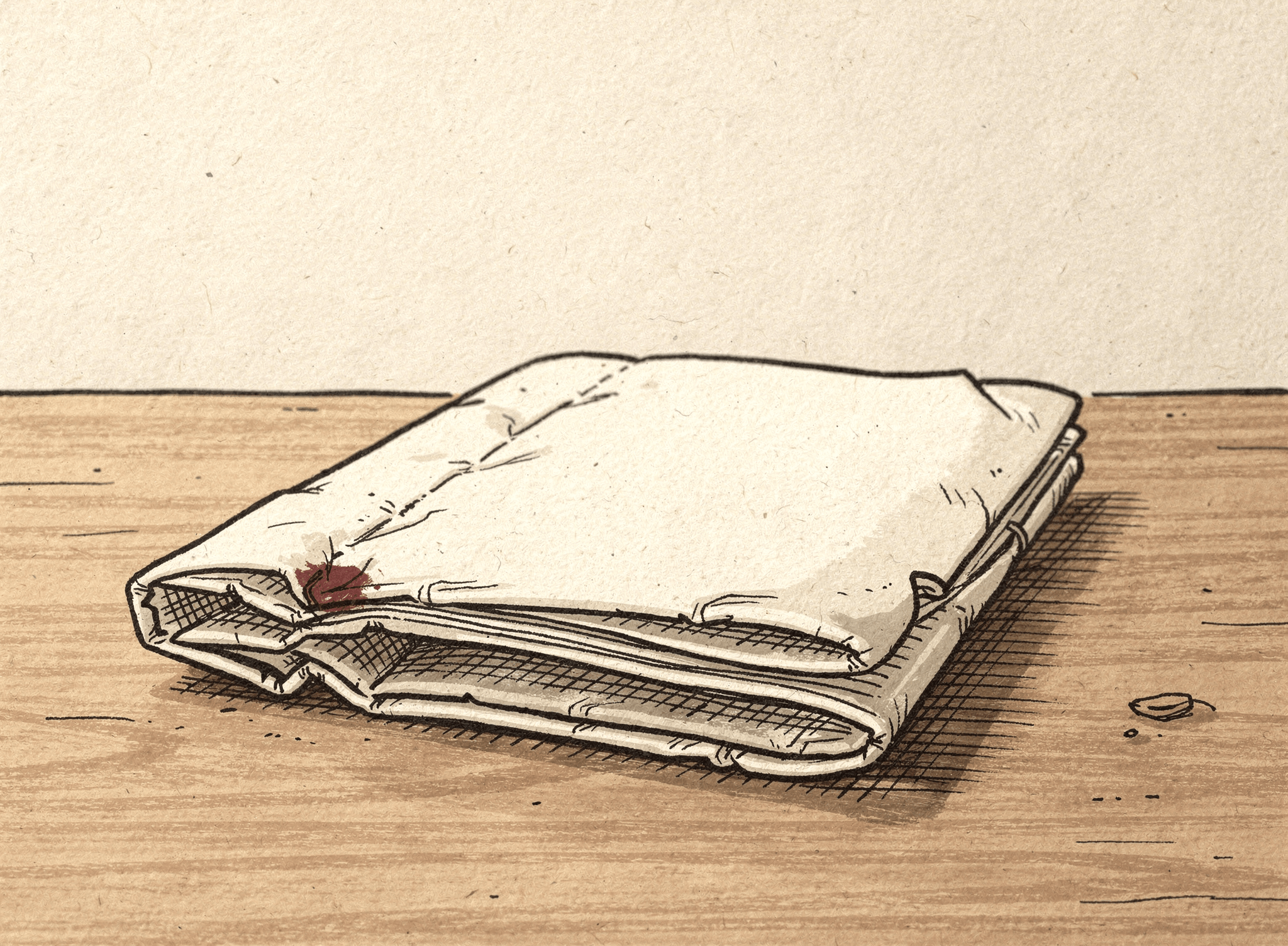 A worn invoice, folded shut and seen edge-on on a desk, a damp stain at one corner.